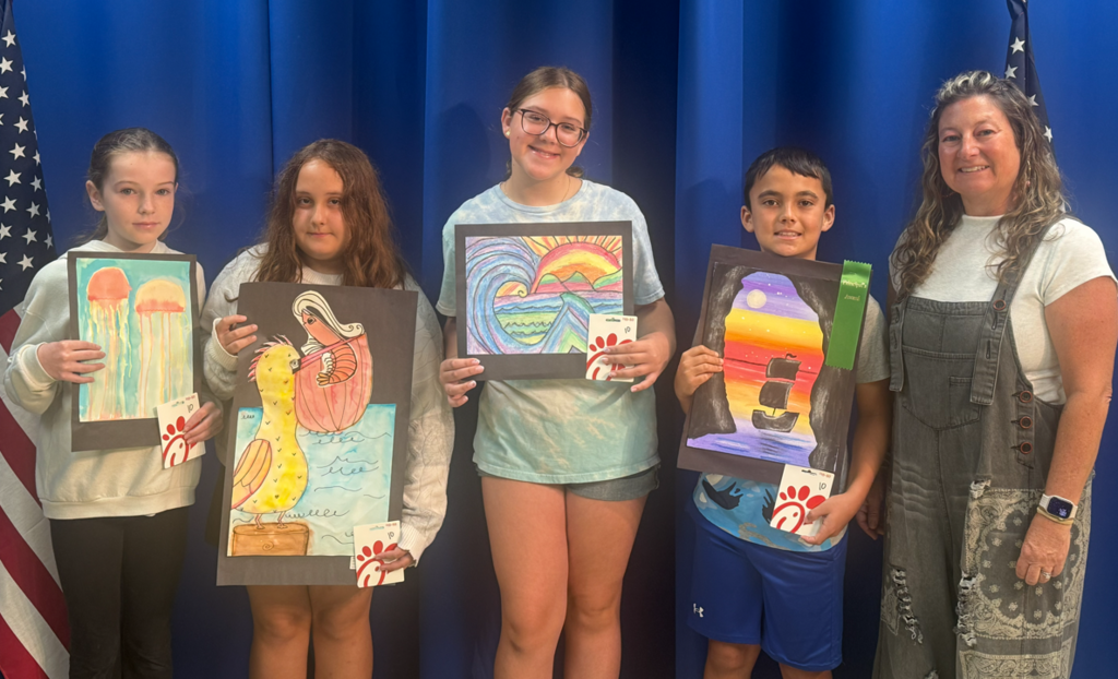 From left to right 3rd grade girl, 4th grade girl, 5th grade girl, 4th grade Principal's award, and Art teacher.  Students holding art and Chick-Fil-A gift cards.