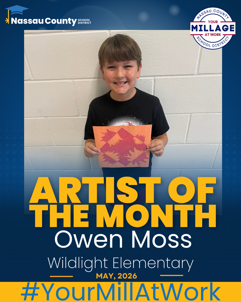 A smiling young boy proudly holds up his artwork, a black and orange geometric Notan square design. He is featured on a promotional graphic titled "Artist of the Month" for Owen Moss from Wildlight Elementary, dated May 2026. The Nassau County School District and Millage logos are visible at the top, and the hashtag #YourMillAtWork is highlighted in yellow at the bottom.