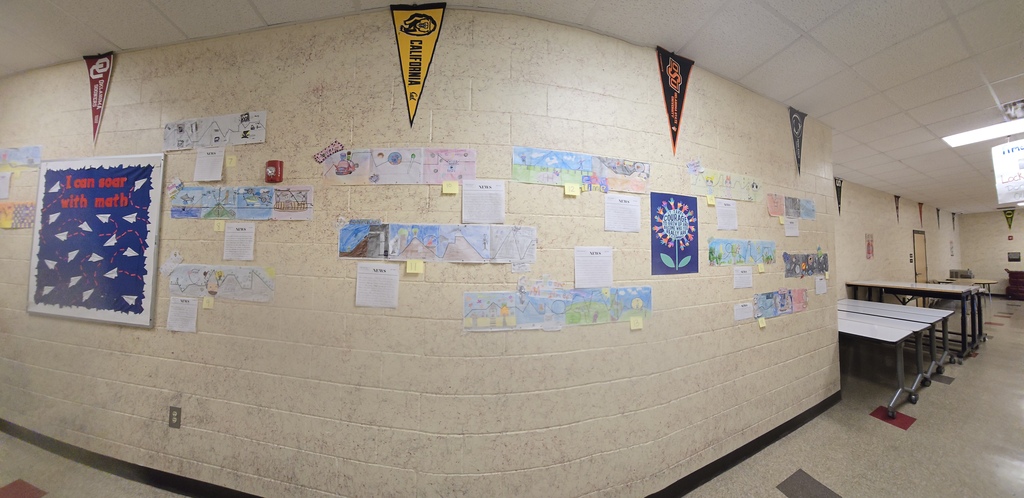 Roller coaster display in classroom hall.