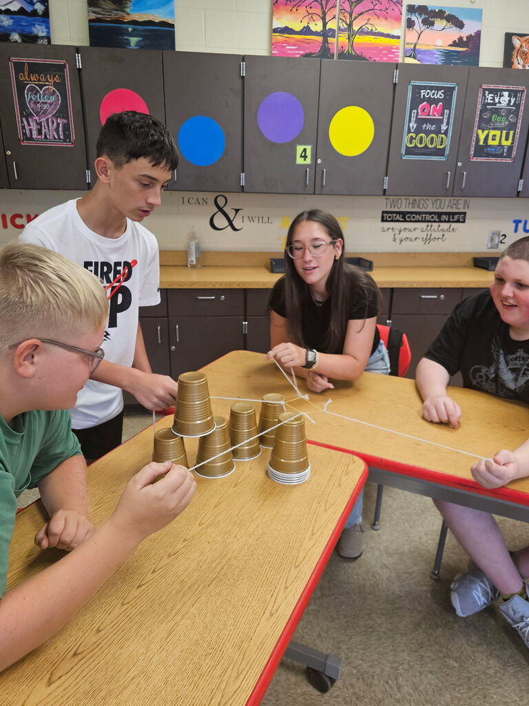 Students working together on team building activity.