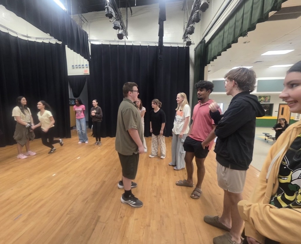 YHS Theatre students on stage, practicing