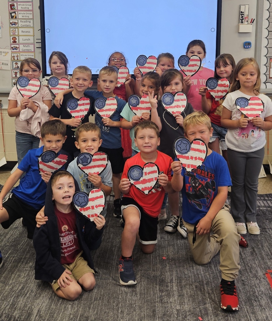 elementary students with a 9-11 craft