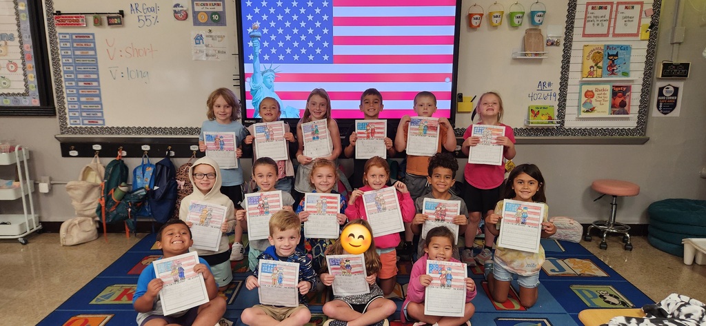 elementary students with a 9-11 craft