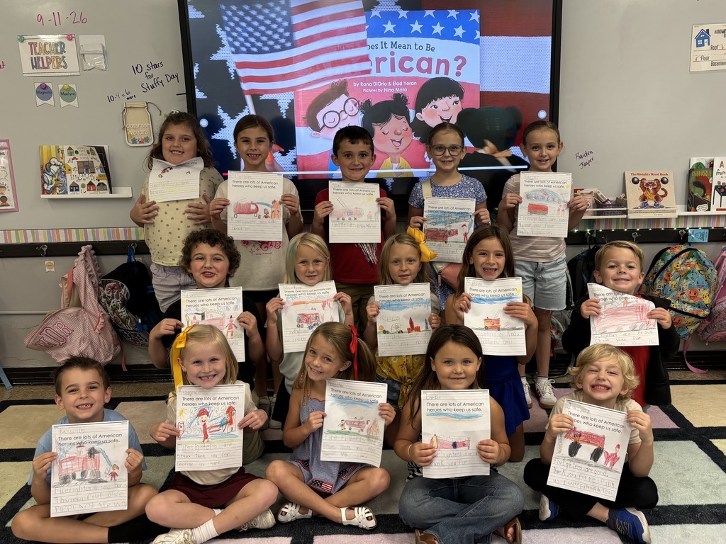 elementary students with a 9-11 craft