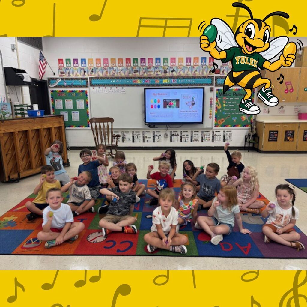 Kindergarten music lesson featuring colorful egg shakers and a duck activity. Students practice proper shaker positions, shake their instruments to the word “quack,” and listen for different duck sounds to build rhythm and listening skills.