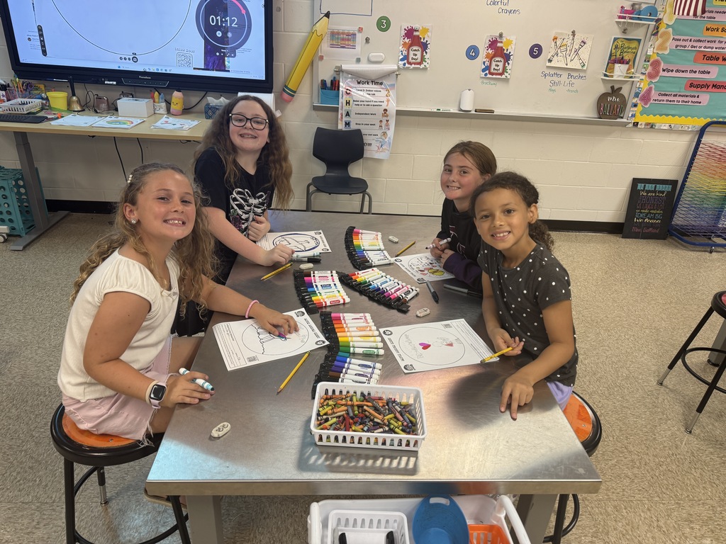 Wildlight students in grades 2–4 create colorful, encouraging patch designs as part of the Oliver Patch Project, using their artwork to spread kindness, hope, and smiles to children battling cancer in hospitals across America.