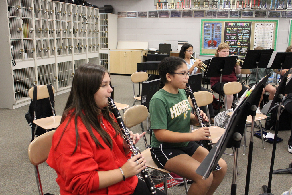 students playing in band class