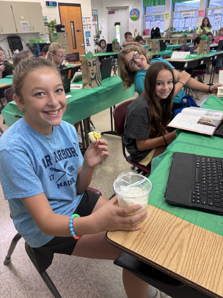 Students smile while enjoying books and special treats during their Starbooks reading experience. Reading is even sweeter when learning feels this fun! 