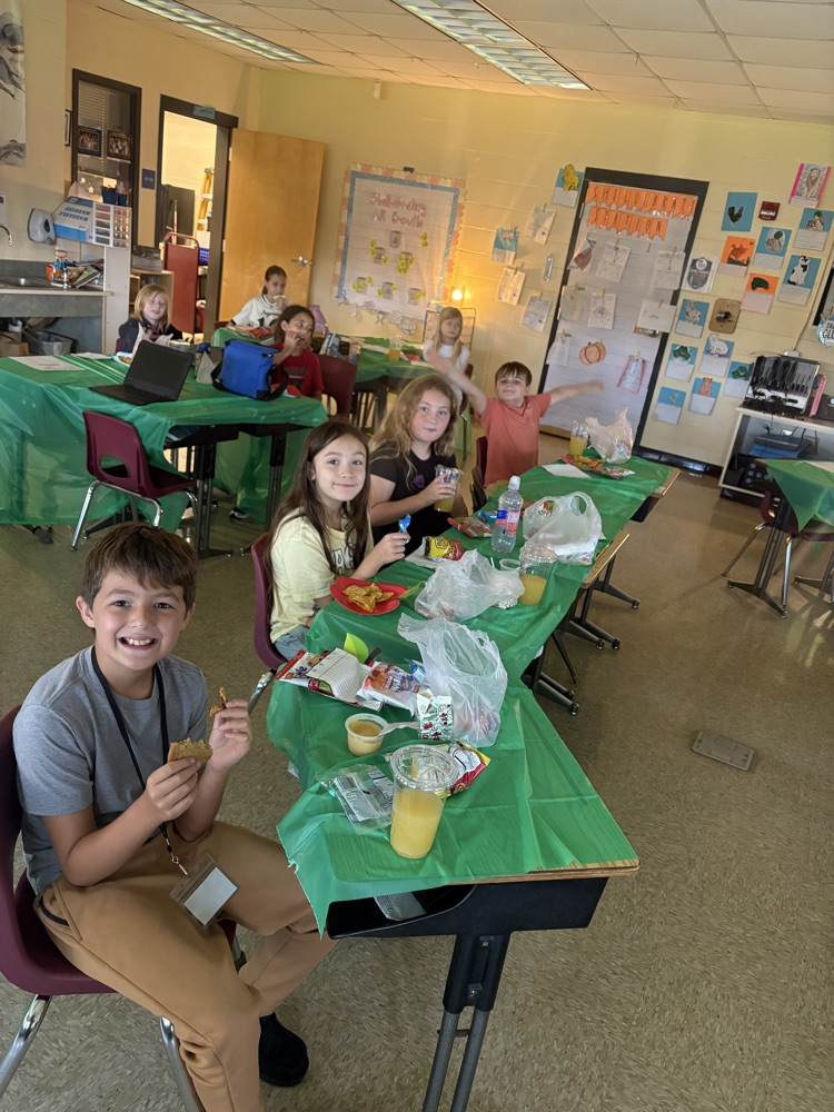 Students smile while enjoying books and special treats during their Starbooks reading experience. Reading is even sweeter when learning feels this fun! 