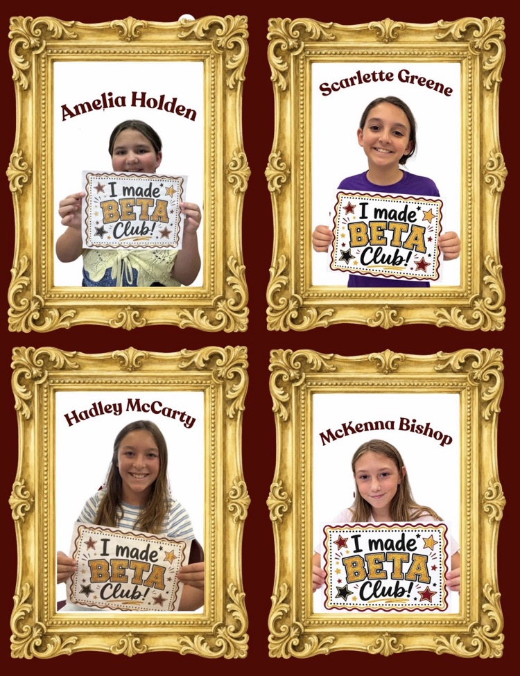 Four proud CIS students smile while holding signs celebrating their acceptance into BETA Club. Congratulations to our newest BETA members! 