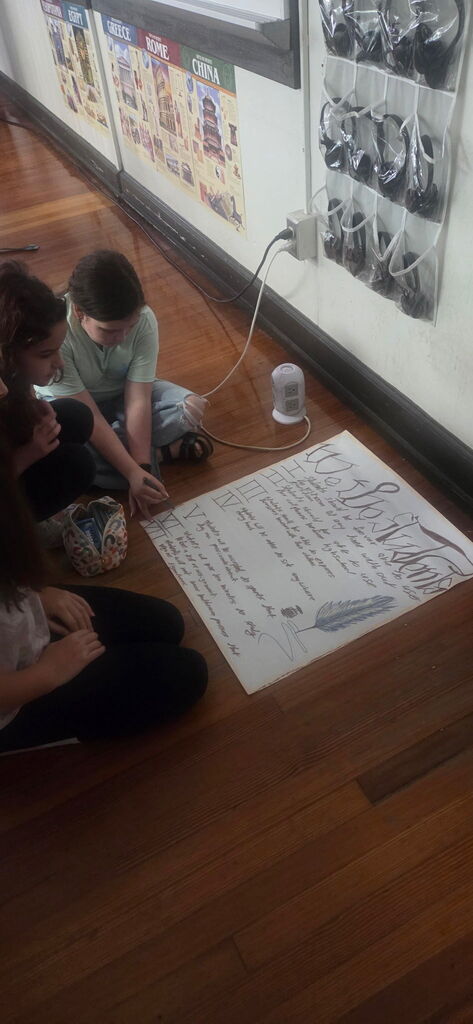 Students creating posters in Mr. West class.