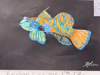 YHS art displayed at fair booth