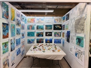 YHS art displayed at fair booth