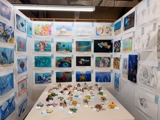 YHS art displayed at fair booth
