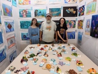 YHS art displayed at fair booth