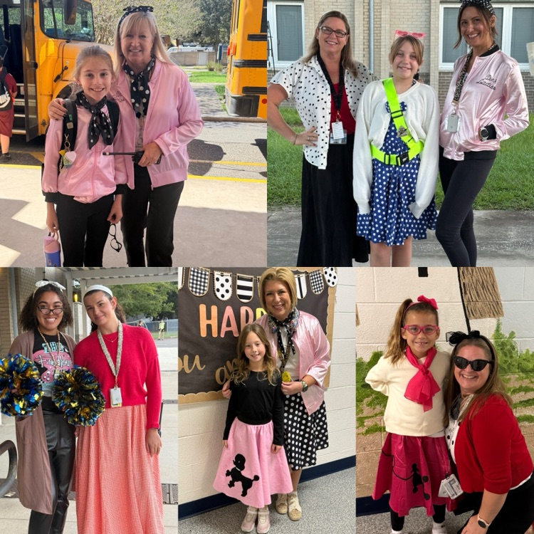 staff posed with students dressed in 50s style to celebrate the 50th day of learning 