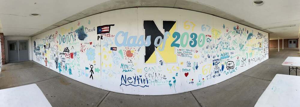Nauset middle school class of 2030 painted on outdoor wall of school