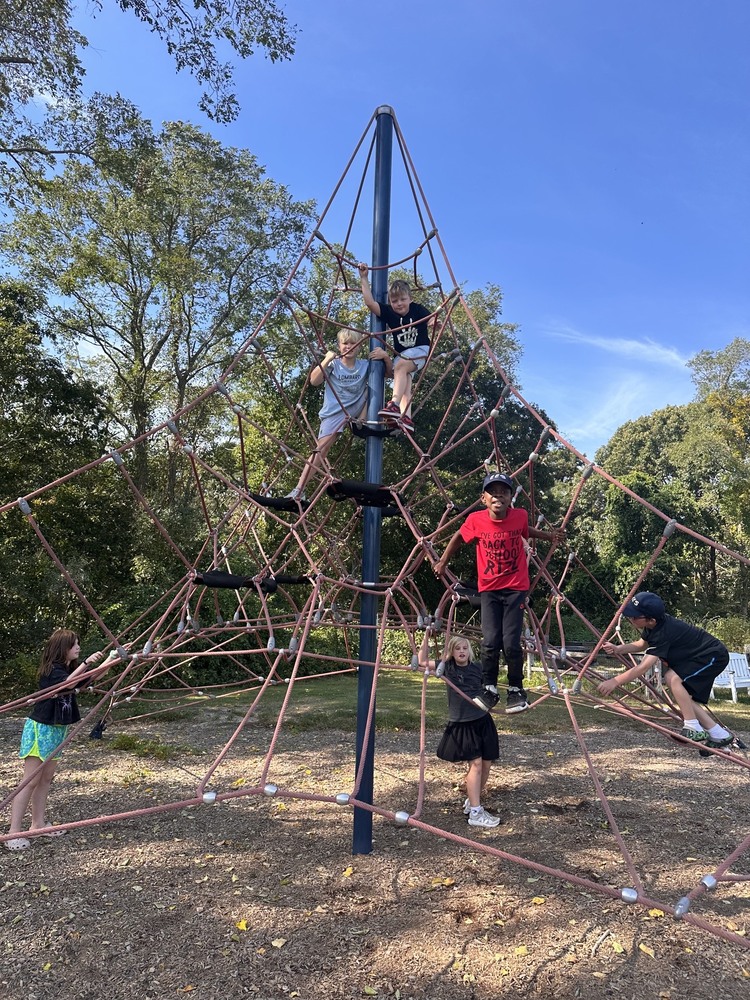 kids on climbing structure