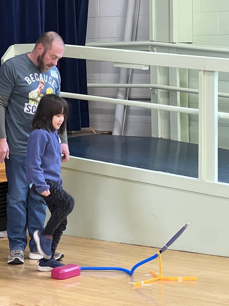 OES students and their families had a blast at STEM Night, launching stomp rockets in the cafeteria!
