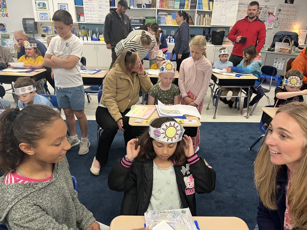 First graders warmly welcomed friends and family to celebrate their beautiful poems and illustrations about the sun and the moon! What a wonderful gathering!