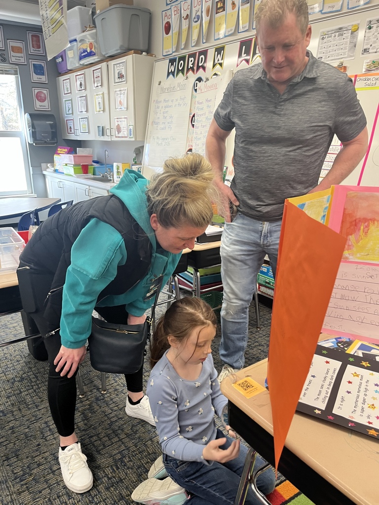 First graders warmly welcomed friends and family to celebrate their beautiful poems and illustrations about the sun and the moon! What a wonderful gathering!