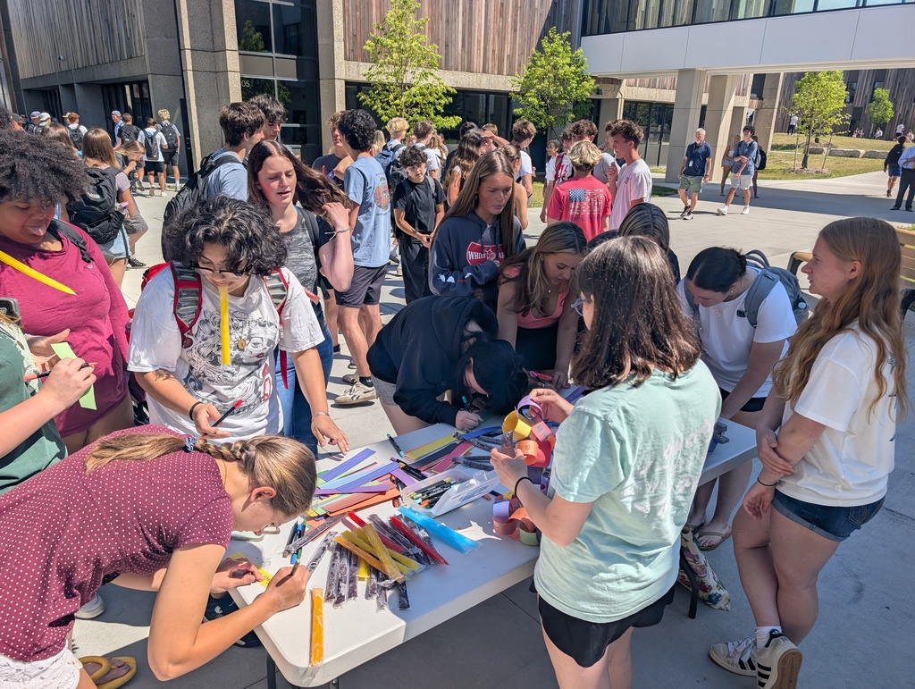 Hope Squad giving out ice pops and having students share what they are hopeful for in between finals
