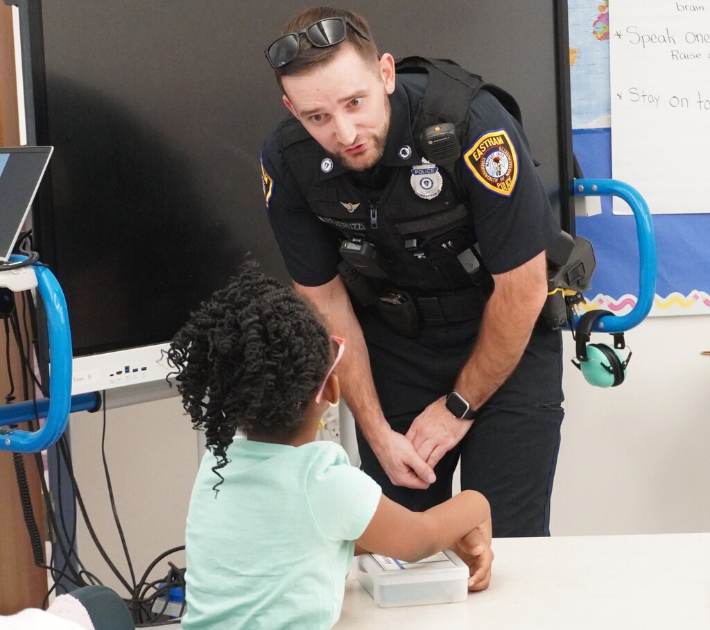 school resource officer talks to student