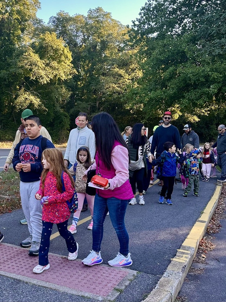 staff and students walking to school