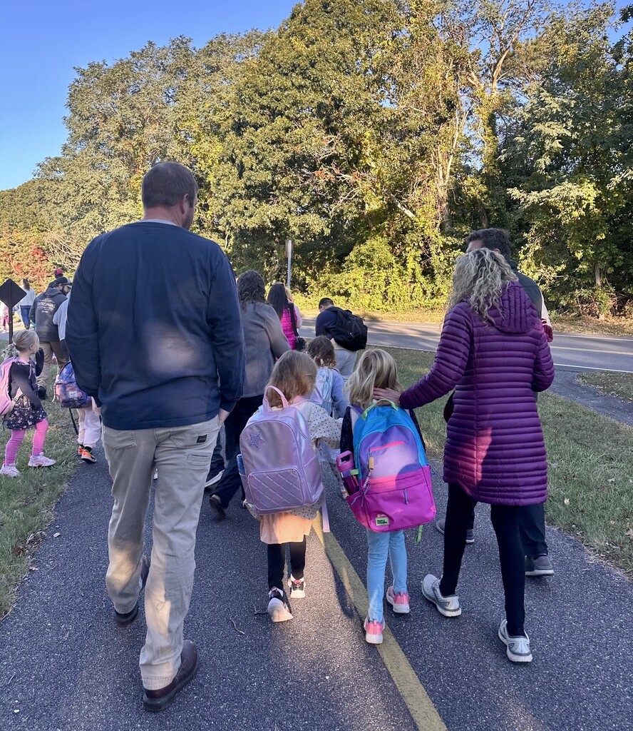 students walk to school with parents