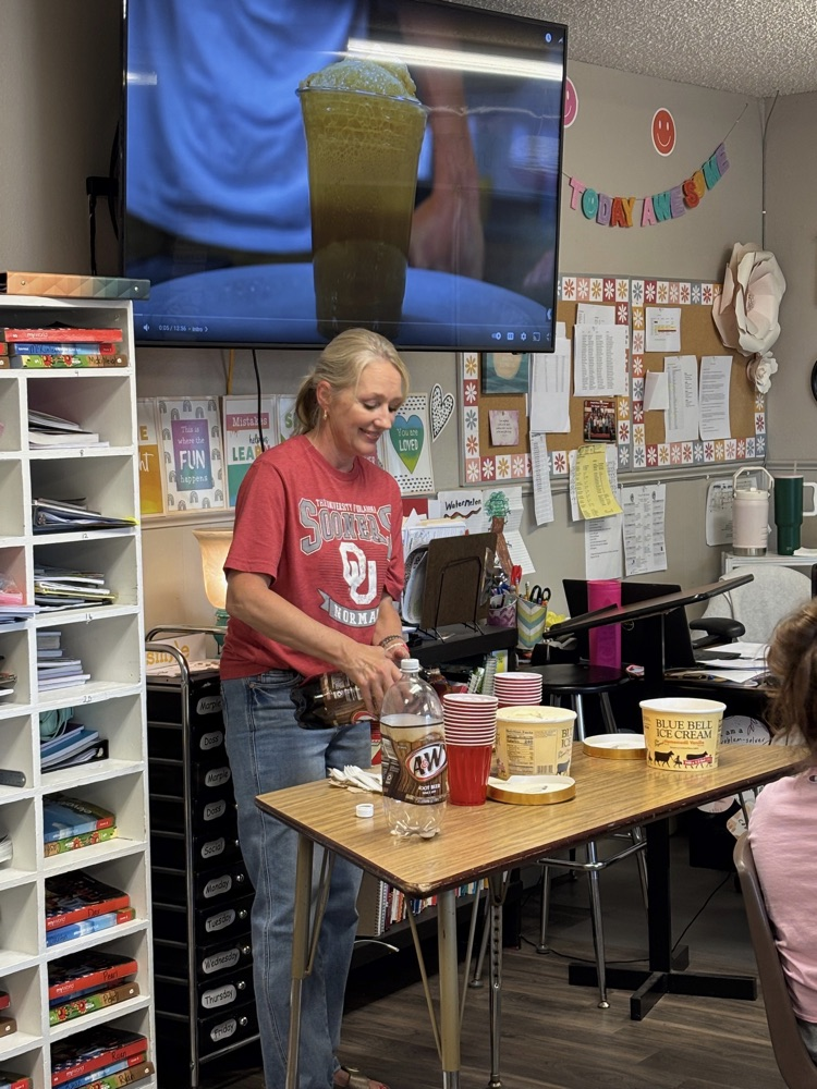Mrs Marples class making root beer floats  