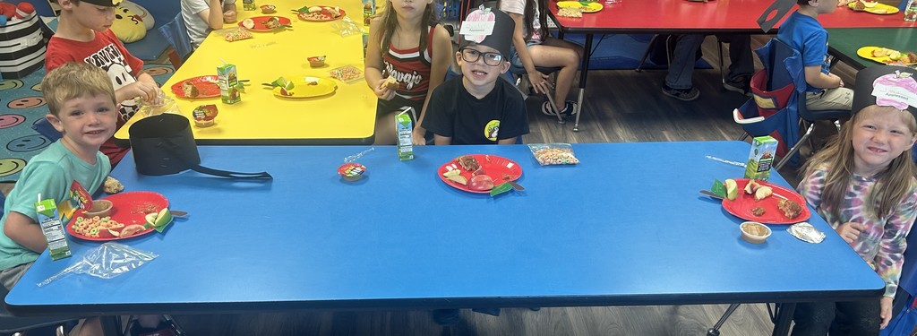 Elementary students celebrating Johhny Appleseed day