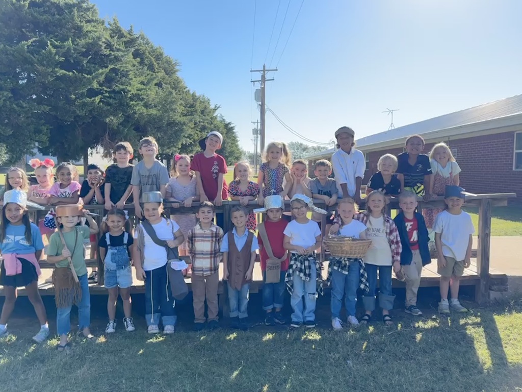 Elementary students celebrating Johhny Appleseed day