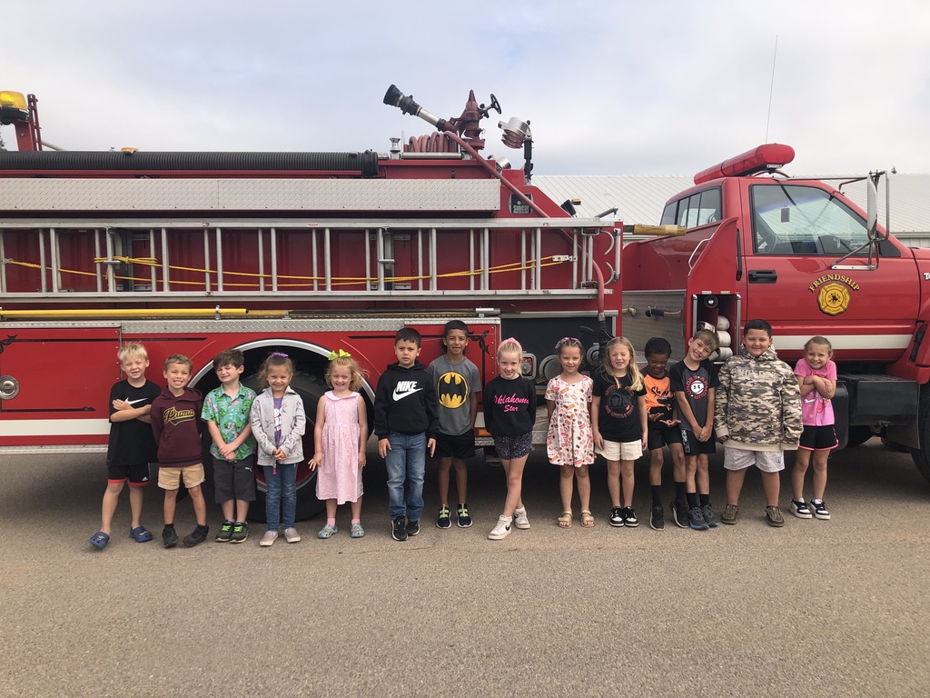 Fire fighters visit navajo students.