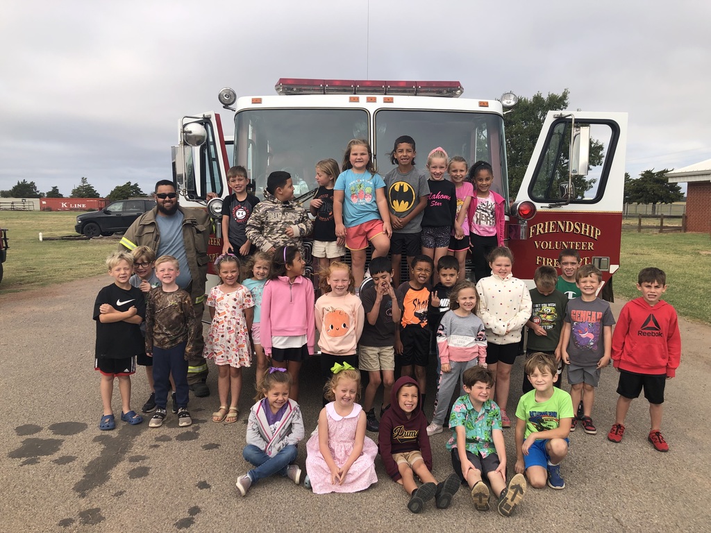 Fire fighters visit navajo students.