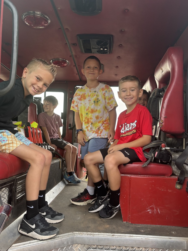 Fire fighters visit navajo students.