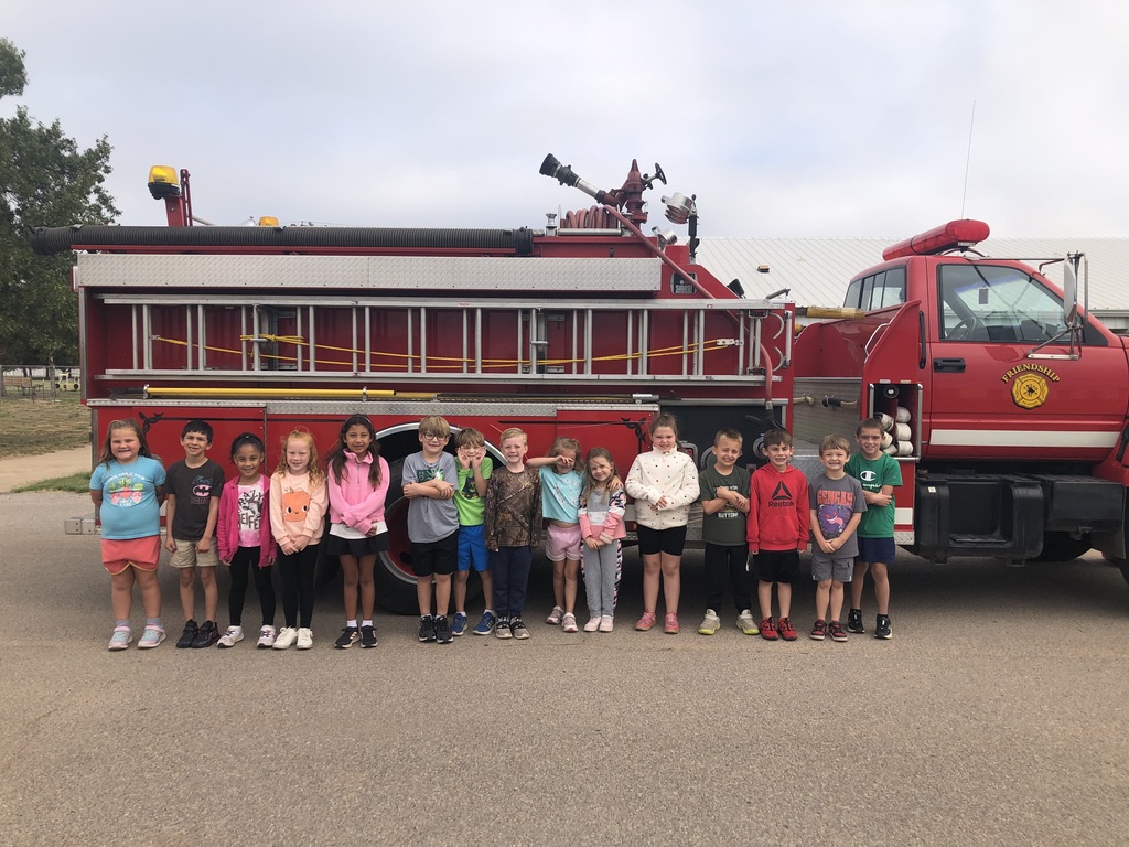 Fire fighters visit navajo students.