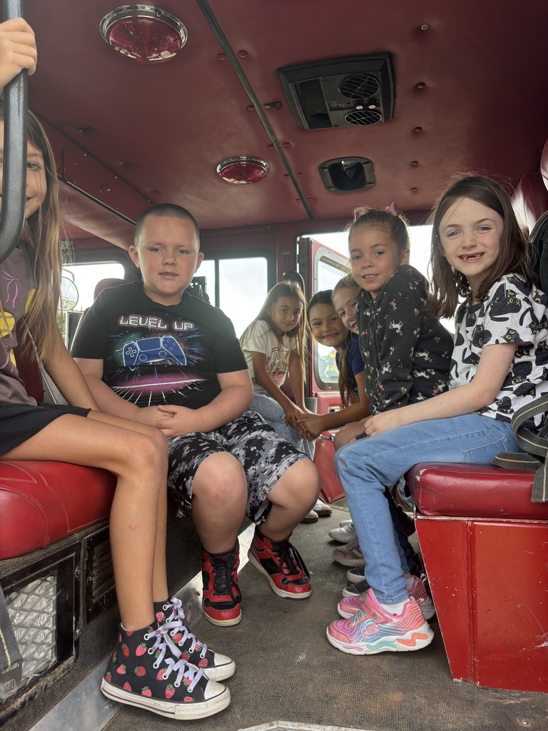 Fire fighters visit navajo students.