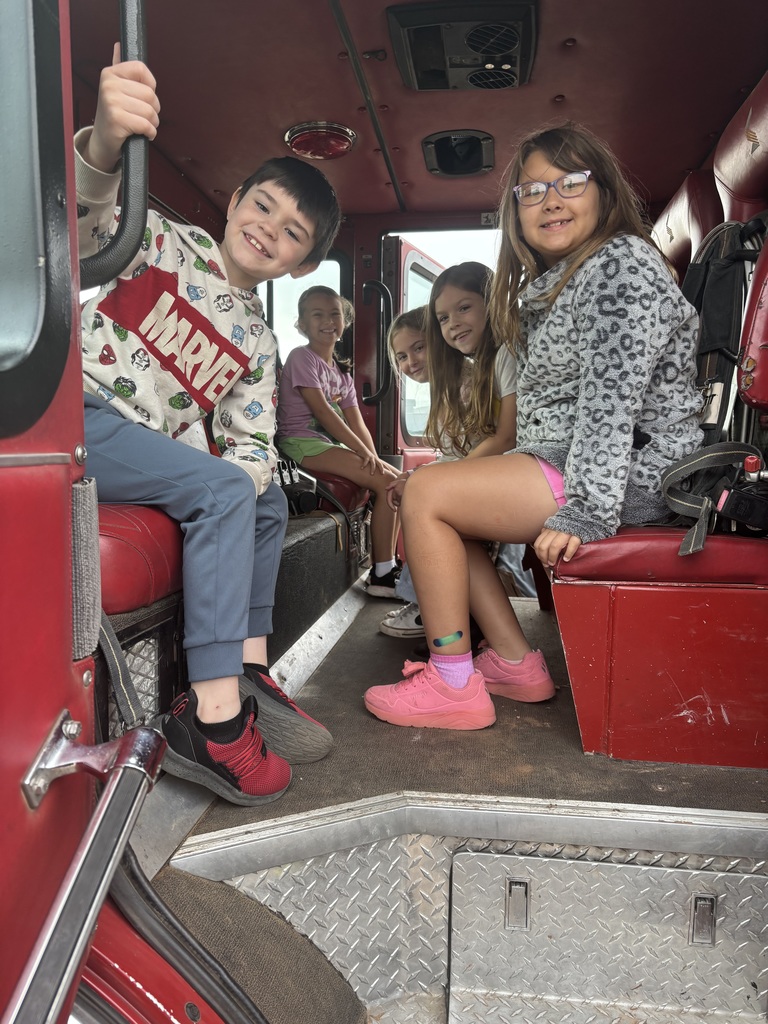 Fire fighters visit navajo students.