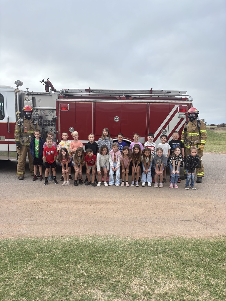 Fire fighters visit navajo students.