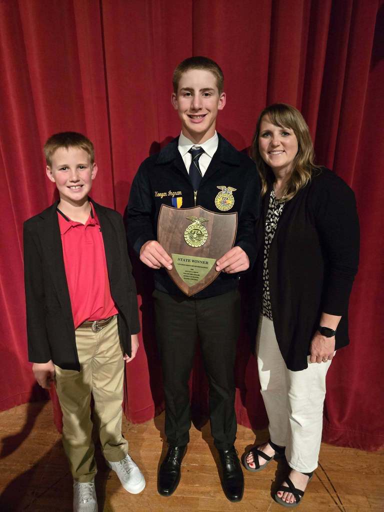 Keegan with mom and brother