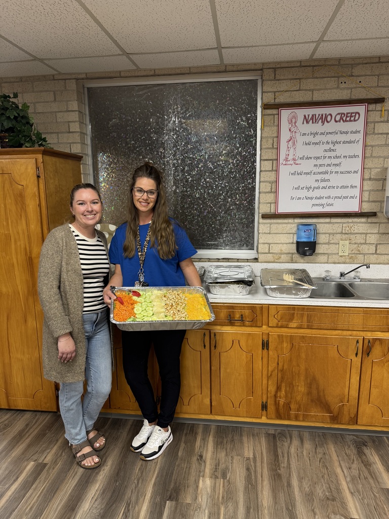 Staff holding JDs food