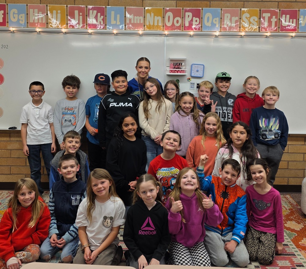 miss bever and her third grade class celebrating her award of teacher of the year