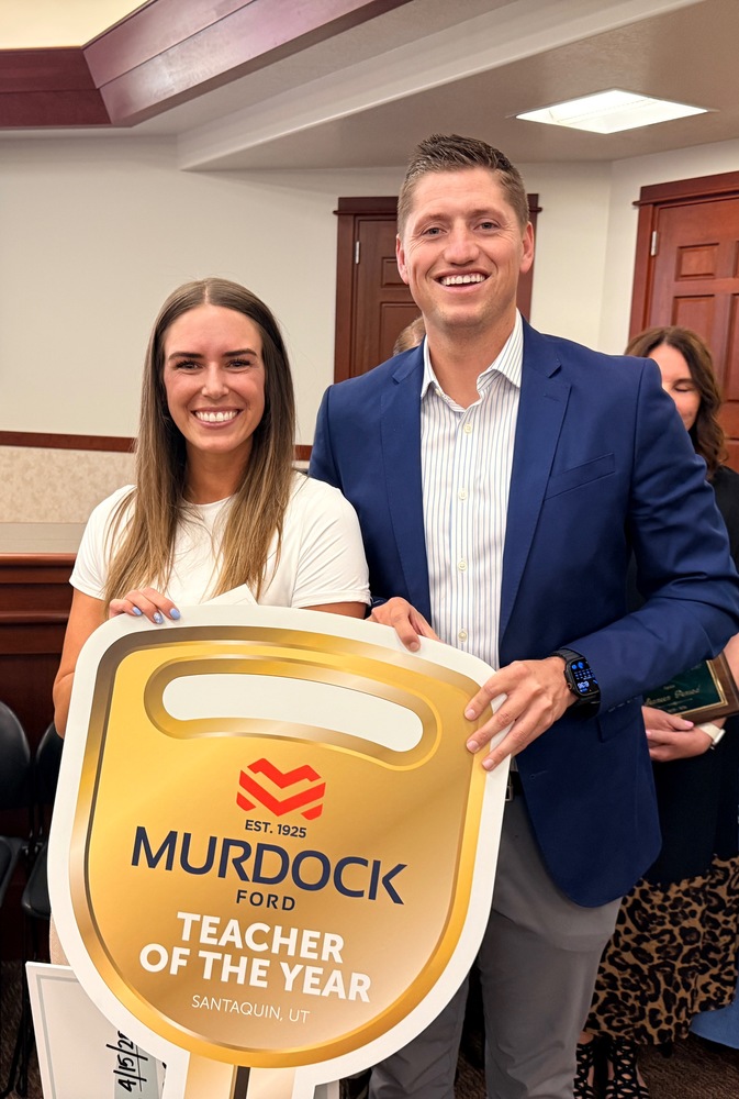 Samantha Jasperson with Dain Murdock of Murdock Ford in Santaquin