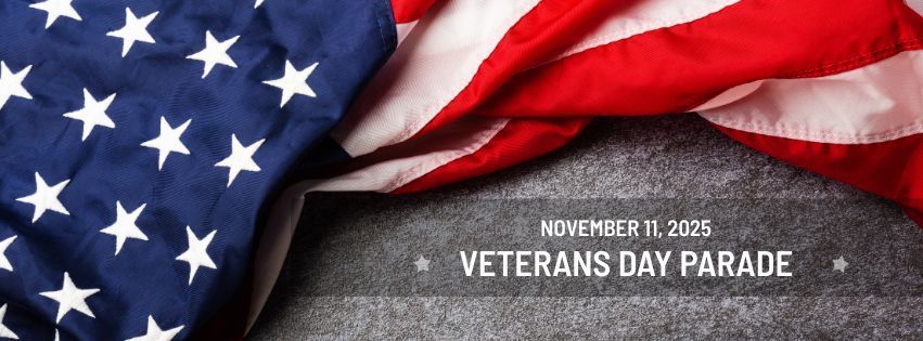 American flag with the words "Veterans Day Parade 11/11/2025"