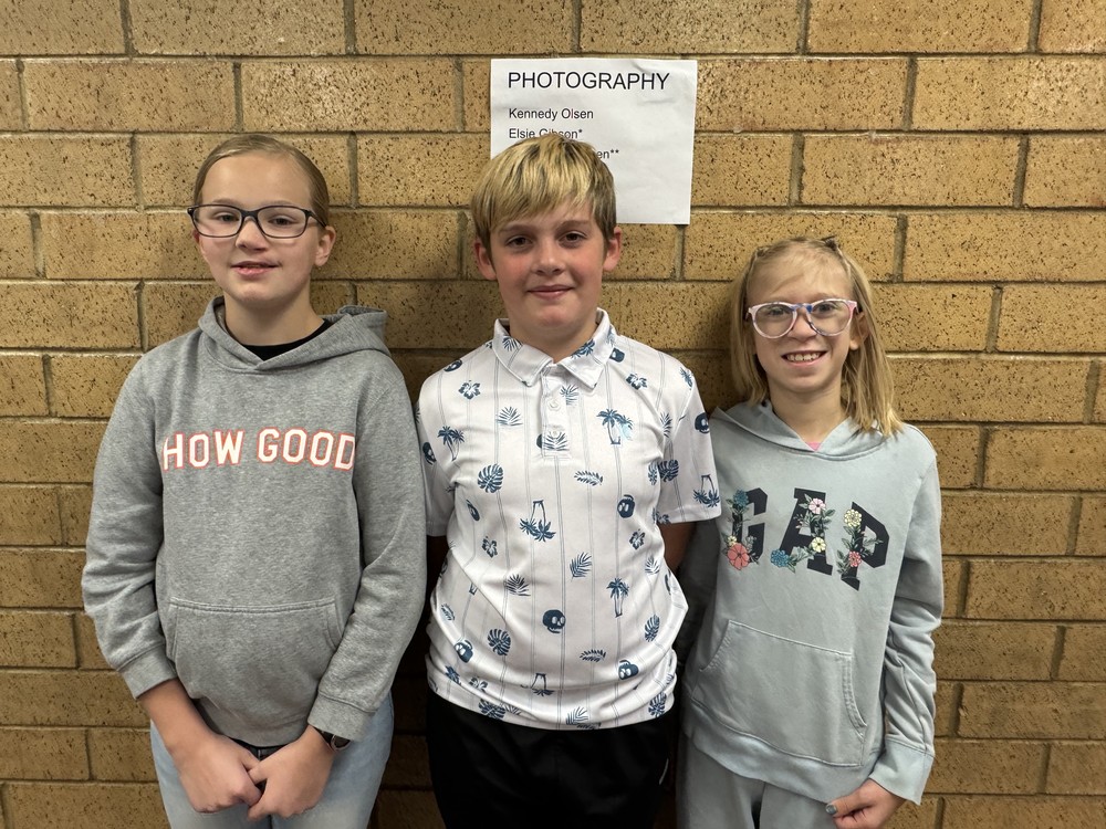 3 kids getting picture done