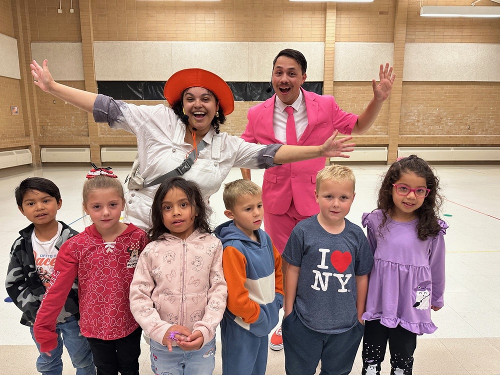 Kids at [a play with two actors