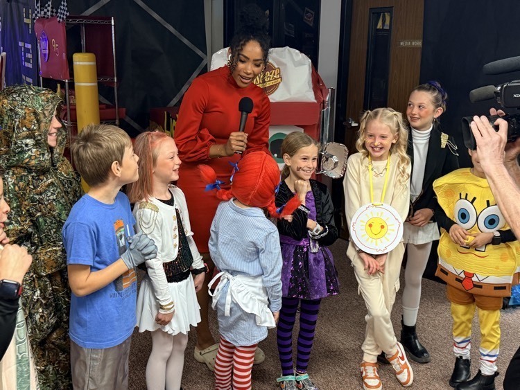 reporter talking with students