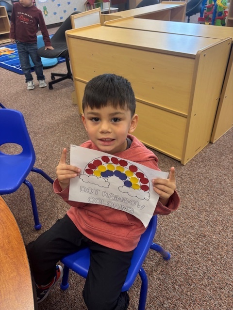 Students showing off their coloring