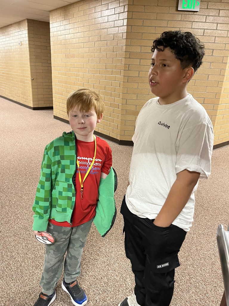 students talking in the hall