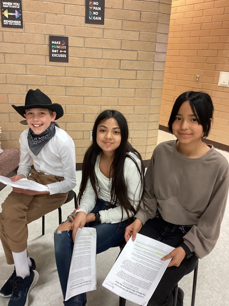 Students practicing for the play
